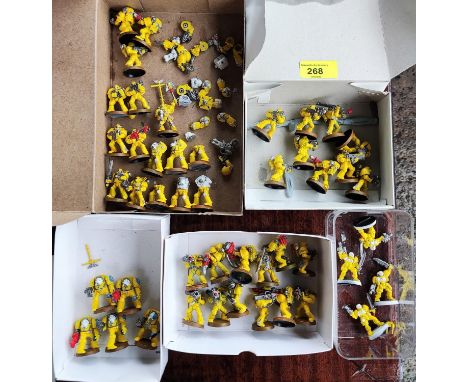 A selection of vintage Games Workshop Warhammer 40,000 Space Marine models, a metal Chaplain, plastic and metal terminators, 