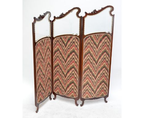 A early 20th century  French three panel two fold screen with glazed scrolling upper section and fabric panels beneath raised