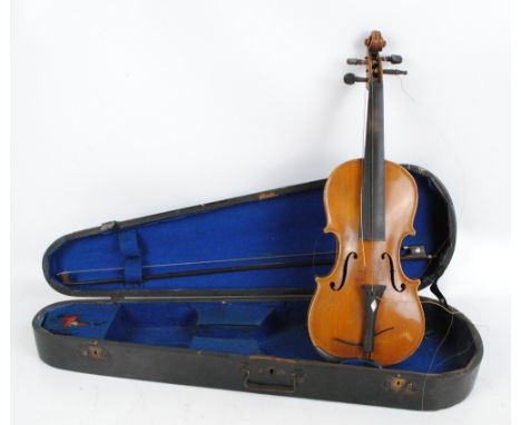 An early 20th century cased three-quarter size violin with two-piece mother of pearl inlaid back and associated bow, length o