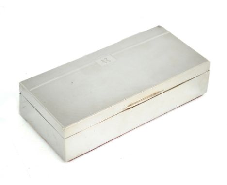 A George VI hallmarked silver cigarette/cigar box, with engine turned decorated hinged lid and also engraved with initial 'R'