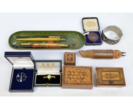 A small group of collectors' items including a Tunbridge ware style stamp box decorated with a Victorian stamp, two lidded tr