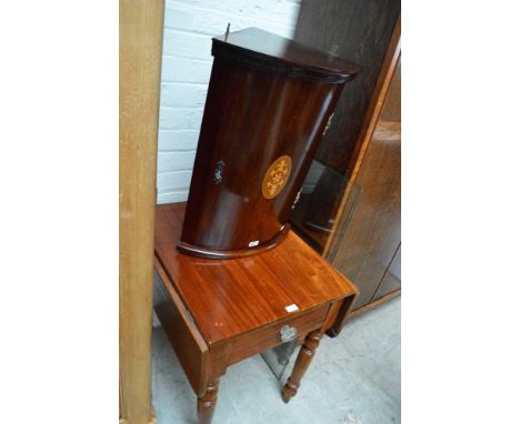 A reproduction mahogany corner cupboard with central oval inlaid panel with dentil moulding to the cornice and small 20th cen