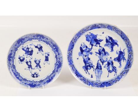 A late 18th/early 19th century Chinese porcelain plate painted in underglaze blue with eight immortals seated upon various ce