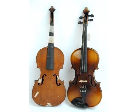 A full size Czechoslovakian violin, Stradivarius copy, length of back 35.6cm and a full size violin for restoration, length 3