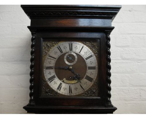 PRESTONS LTD OF BOLTON; a 1920s oak longcase clock, the square dial set with silvered chapter ring, subsidiary seconds dial a