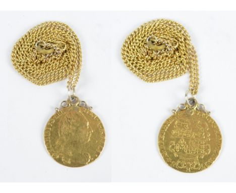 A George III guinea, 1784, with soldered suspension ring on base metal curb link chain necklace.