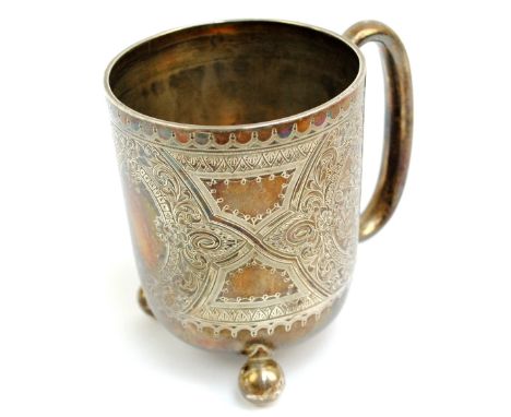 WALKER & HALL; a Victorian hallmarked silver christening mug, overall engraved with floral and foliate scroll motifs, centred