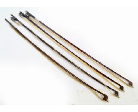 A silver mounted violin bow, a indistinctly stamped bow with patent adjusting mechanism and two other bows (af) (4).