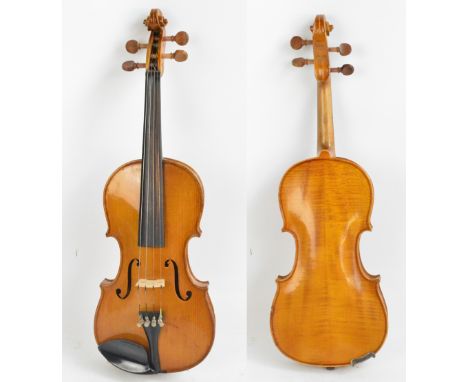 A Czechoslovakian three-quarter size 'Concert Violin', Stradivarius copy with label, the two-piece back 33.3cm.   CONDITION R