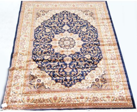 A blue ground Keshan carpet, 280 x 200cm.