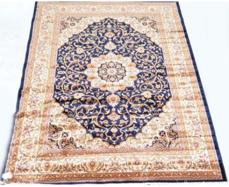 A blue ground Keshan carpet, 280 x 200cm.