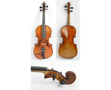 A full size German viola, Stradivarius copy with label dated 1886, the two piece back length 39.4cm, cased with a modern bow.