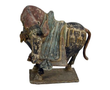 A Chinese Tang Dynasty (618-907) polychromed ceramic figure of caparisoned horse on rectangular base, height 37cm, length 38c