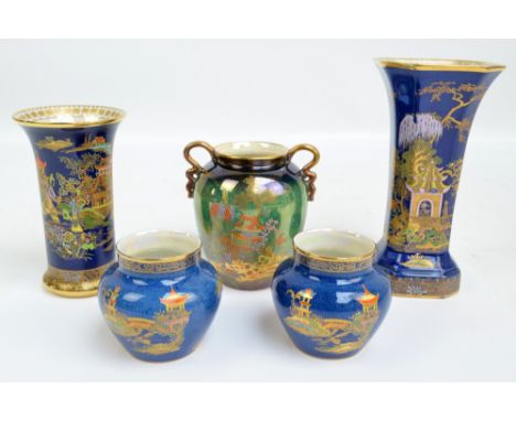 A group of Carlton Ware vases including a pair of squat baluster examples painted with Oriental architectural landscape on bl