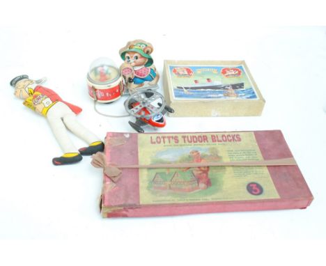 A small collection of 1940s/1950s toys comprising a boxed set of Lott's Tudor blocks, Stone Bricks no 3 set, a boxed Chad Val