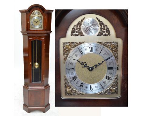 A reproduction longcase corner clock with arched top, brushed chapter ring bearing Roman numerals, glass spandrels and the ea