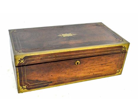 A mid 19th century rosewood and brass bound campaign writing slope, the hinged lid centred with a vacant cartouche enclosing 