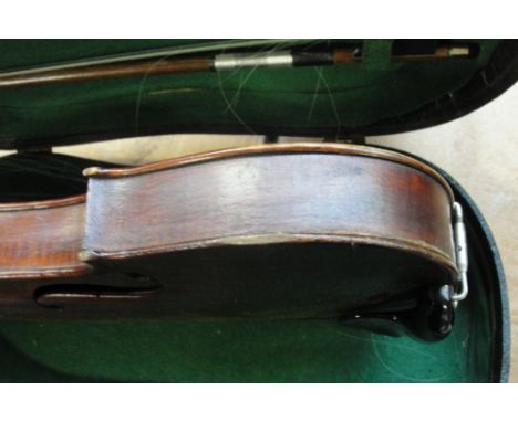 A full size German violin, with one-piece back measuring 36cm, cased with bow (badly af).   CONDITION REPORT:  Violin in poor
