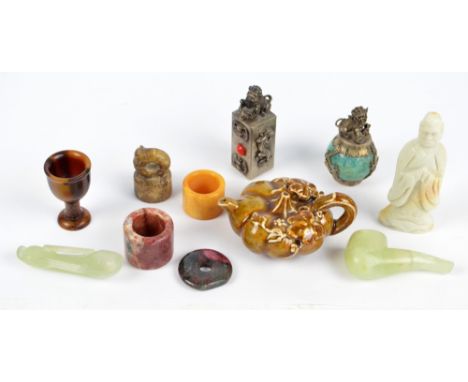 A small group of various Oriental items including a Tibetan white metal mounted hardstone vacant seal, a quartz pipe and spoo