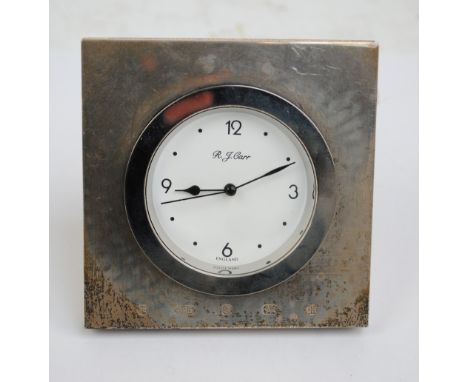 CARR'S OF SHEFFIELD LTD; an Elizabeth II hallmarked silver fronted square travelling clock, Sheffield 2000, 10 x 10cm.