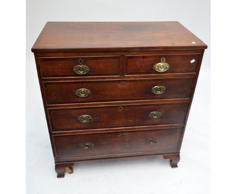 A 19th century oak and mahogany crossbanded chest of two short and three long graduated drawers raised on ogee bracket feet, 