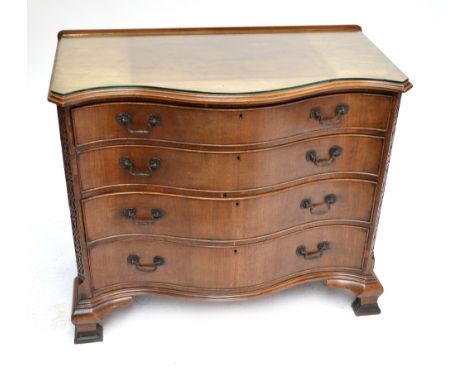 A 19th century mahogany serpentine chest of drawers, the moulded rectangular top above four long graduated drawers and raised