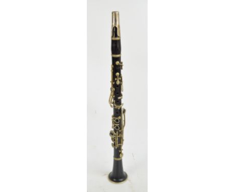 A leather cased ebonised clarinet inscribed 'Jedson, Manufactured in Italy by A. Rampone, Ditto Riumite, 8, Cazzaniro'.
