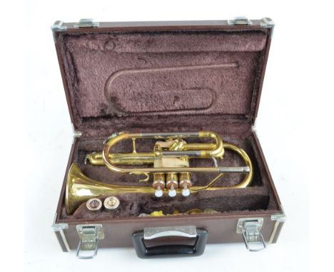 A brass cornet, in Yamaha case.