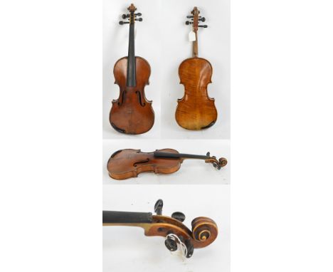 A full size, probably German, violin with interesting hand written inscription 'Fair par Jean Baptiste.....a Mirecourt age 18