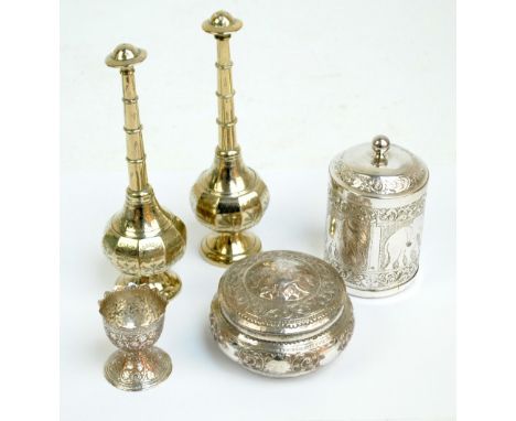 A group of various Eastern white metal items comprising a pair of rose water droppers, height 19.5cm, an Indian egg cup, a te