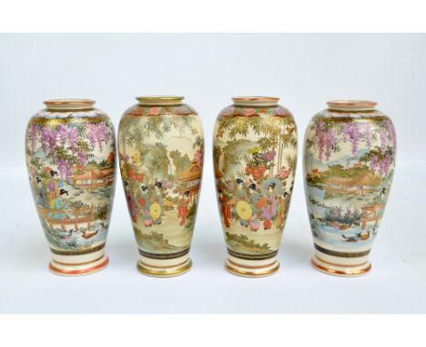 Two pairs of Japanese Meiji period Satsuma baluster vases, each painted in enamels with figural scenes in architectural lands