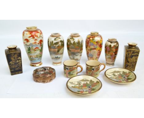 A group of various Japanese Meiji period Satsuma vases including a baluster pair painted with architectural landscape and a s