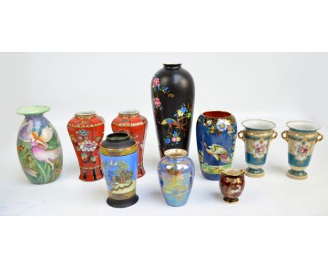 A group of various ceramic vases including a pair of Losol Ware octagonal baluster floral decorated examples, a Marie Graves 