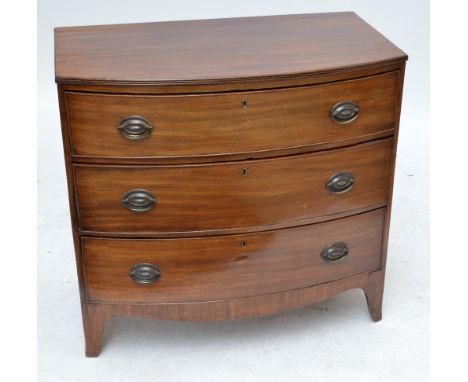 A 19th century bowfronted chest of three long graduated drawers raised on splayed bracket feet, width 91.5cm.