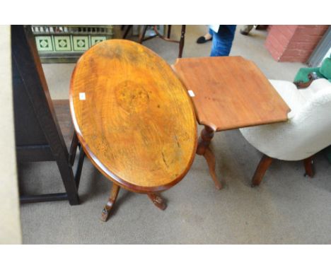 A Victorian inlaid oval table and a tilt top tripod table (2).