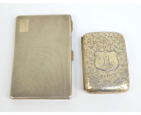 WILLIAM NEALE & SONS; a George V Silver Jubilee hallmarked silver cigarette case of rectangular form with overall engine turn