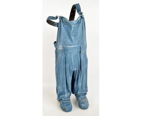A novelty fibreglass planter modelled as a pair of freestanding dungarees, height 74cm.
