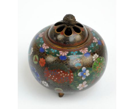 A late 19th century Japanese cloisonné enamel floral and foliate decorated globular koro with pierced detachable cover with f