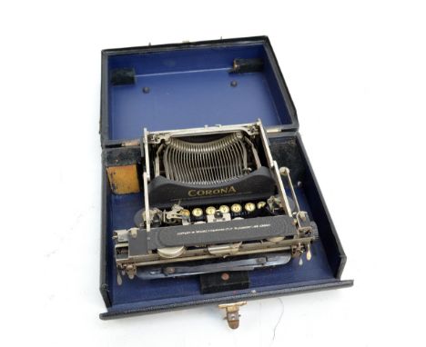 A cased Taylor's Corona typewriter.