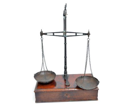 A set of 19th century brass bank scales with screw in bracket and mahogany base with single drawer (af).