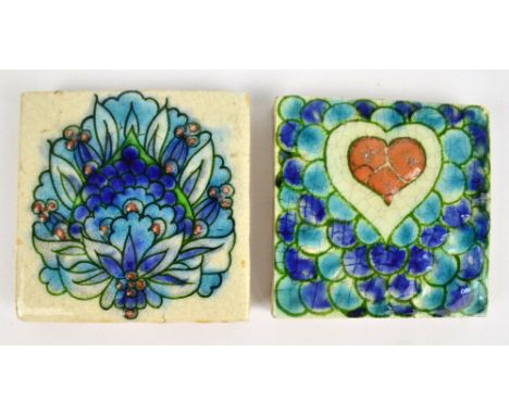 Two similar Pilkington's Royal Lancastrian sample tiles, decorated in the style of William de Morgan, one painted with a hear