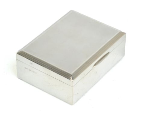 An Elizabeth II hallmarked silver wooden lined cigarette box with engine turned decorated hinged lid, Birmingham 1962, 11.5 x