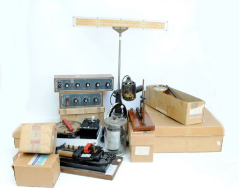 A quantity of apparatus and equipment relating to electricity and magnetism including a Griffin & Tatlock lamp and scale unit