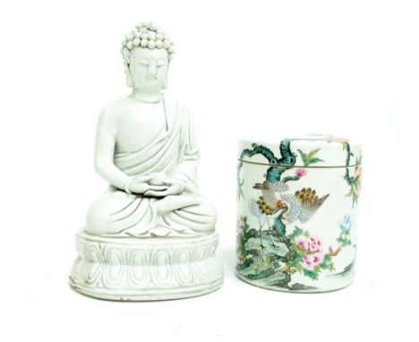 A Chinese porcelain blanc de chine figure of a seated Buddha on double lotus base, impressed seal of He Chaozong to the back,