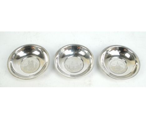 COOPER BROS & SONS; three Elizabeth II hallmarked silver Royal Commemorative pin dishes commemorating the Queen's Silver Wedd