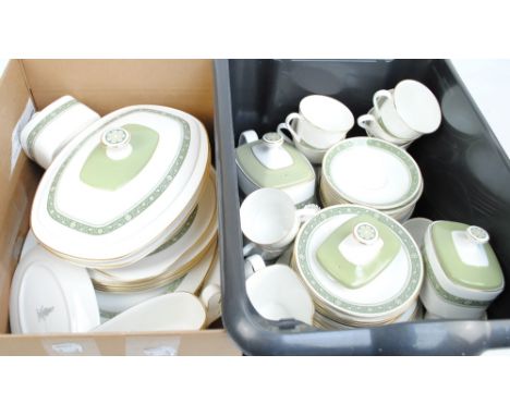 A quantity of Royal Doulton tea and dinner ware in "Rondelay" pattern, H5004, comprising teapot, jug, two lidded sugar bowls,