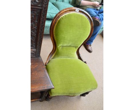 A Victorian spoon back low nursing chair.