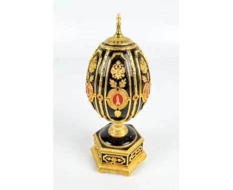 A 20th century Franklin Mint "Imperial Jewelled Egg" for the House of Fabergé, containing miniature chess set (31 piece) and 