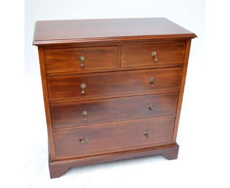 An Edwardian mahogany inlaid chest of two short and three long graduated drawers raised on bracket feet, width 106cm.
