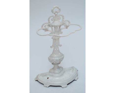 A white painted cast iron stick/umbrella stand with floral decorated baluster shaped stem, height 68.5cm.